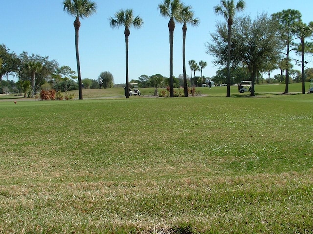 view of home's community featuring a lawn