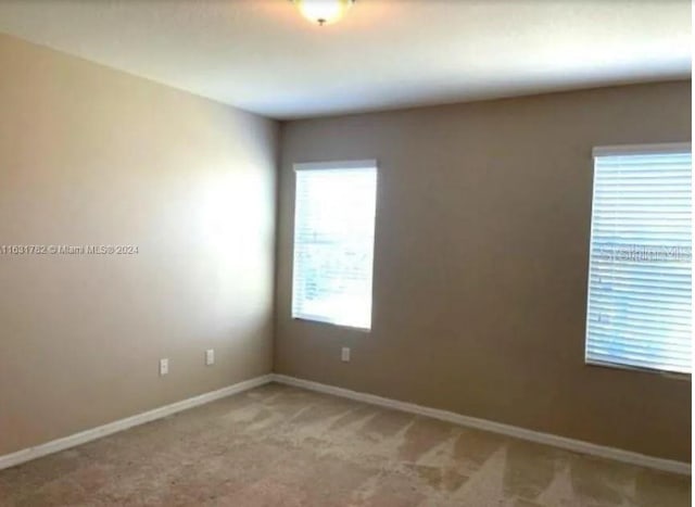 empty room with carpet floors