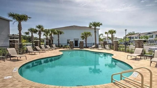 view of pool featuring a patio area