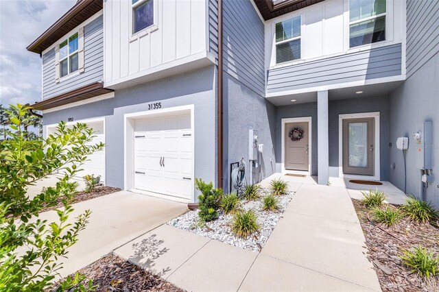 property entrance featuring a garage