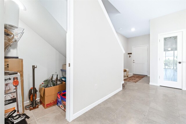 bonus room with light tile patterned floors