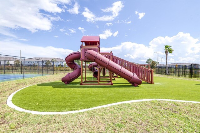 view of playground featuring a yard