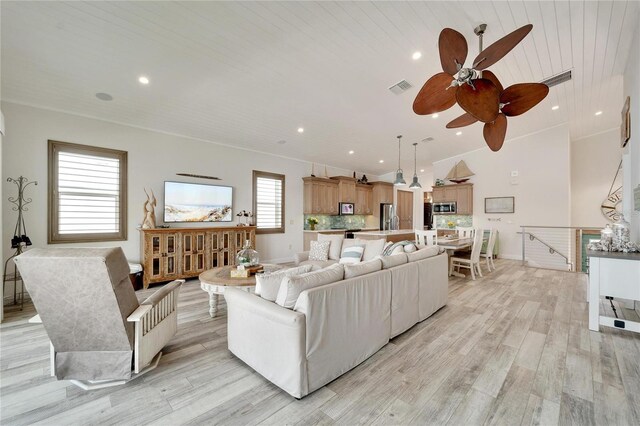 living room with ceiling fan, wooden ceiling, and light hardwood / wood-style flooring