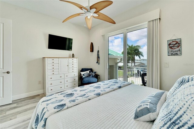 bedroom featuring light wood-type flooring, access to exterior, and ceiling fan