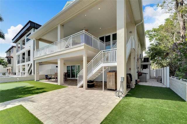 rear view of house featuring central AC, stairway, a patio area, and fence