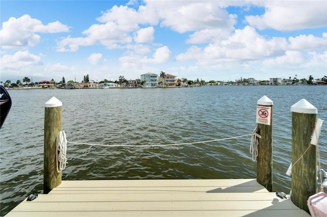 view of dock with a water view