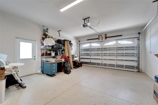 garage featuring a garage door opener