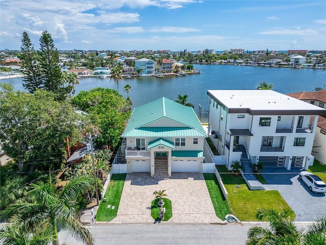 birds eye view of property featuring a water view