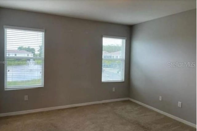 view of carpeted spare room