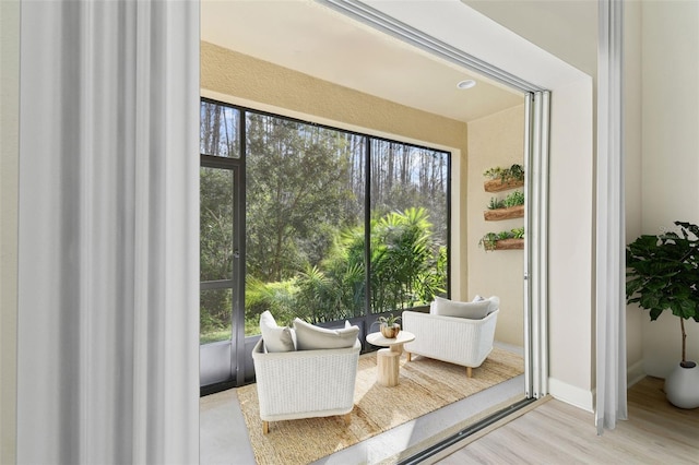 doorway to outside featuring light hardwood / wood-style floors