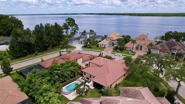 drone / aerial view with a water view