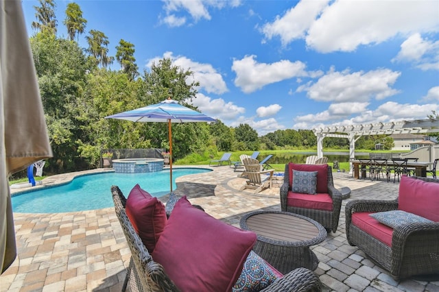 view of swimming pool featuring an in ground hot tub, a pergola, and a patio area