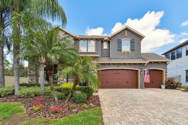 view of front of property with a garage