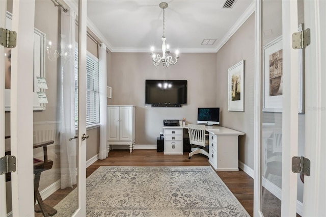 office with french doors, a notable chandelier, dark wood-type flooring, and crown molding