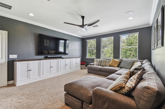 living room with light carpet, ceiling fan, and crown molding