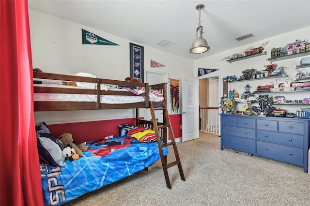 bedroom with light carpet