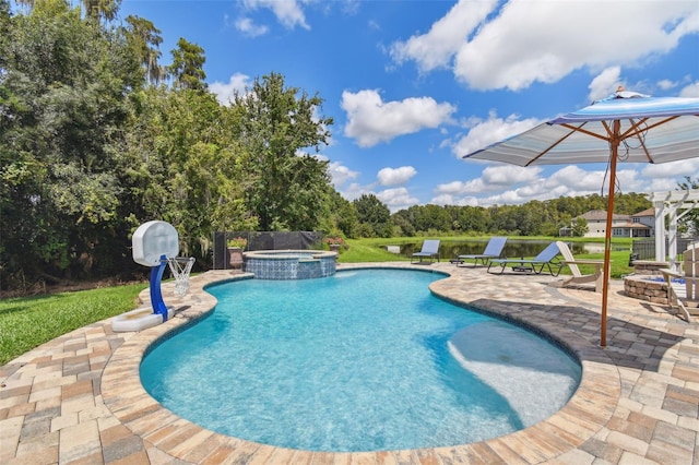 view of pool with an in ground hot tub, a fire pit, and a patio area