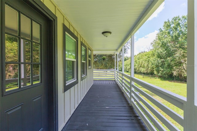 wooden deck featuring a porch