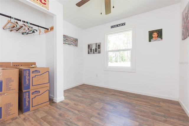 unfurnished bedroom featuring ceiling fan and hardwood / wood-style flooring