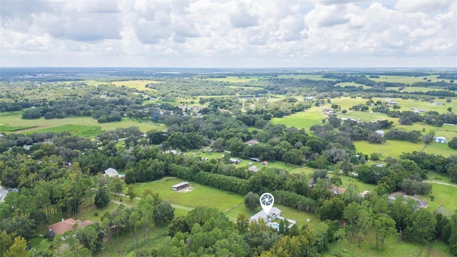 birds eye view of property with a rural view