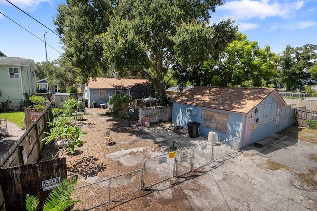 exterior space with a shed