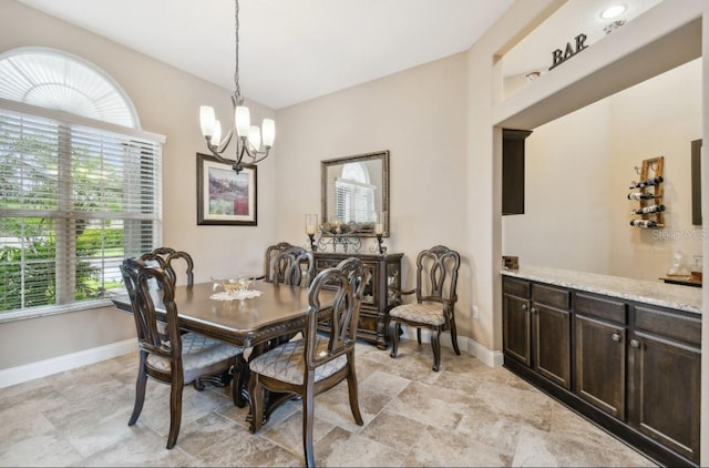 dining room with an inviting chandelier