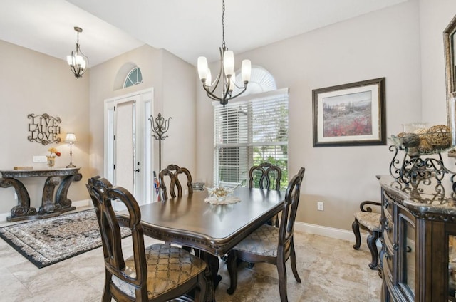 dining area with a notable chandelier