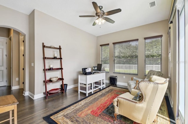 office space featuring dark hardwood / wood-style flooring and ceiling fan