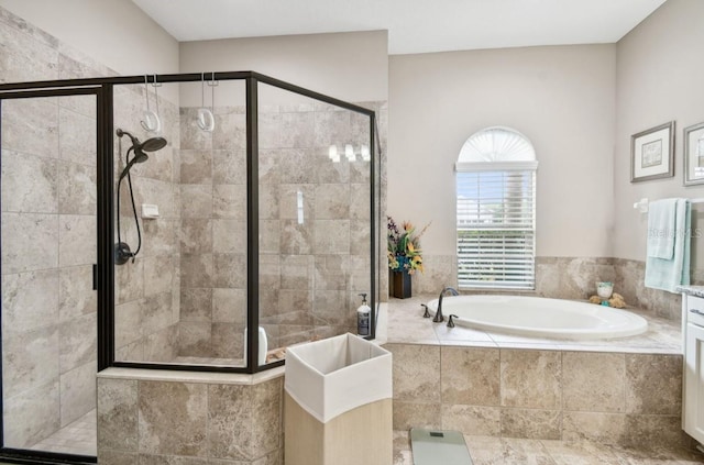 bathroom with separate shower and tub and vanity