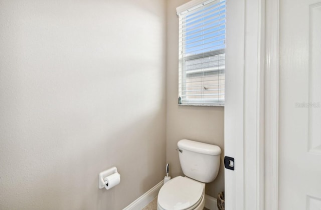 bathroom featuring toilet