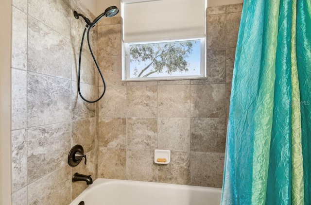 bathroom featuring shower / bath combo