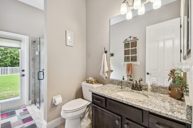 bathroom with plenty of natural light, toilet, and a shower with shower door