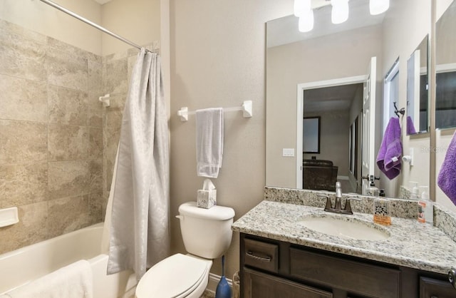 full bathroom featuring shower / bathtub combination with curtain, toilet, and vanity