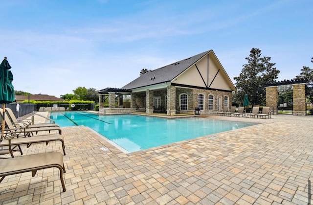 view of swimming pool featuring a patio