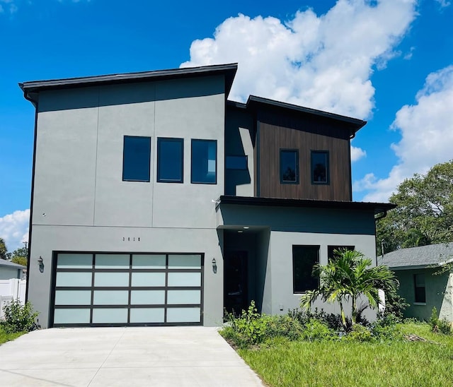 contemporary house featuring a garage