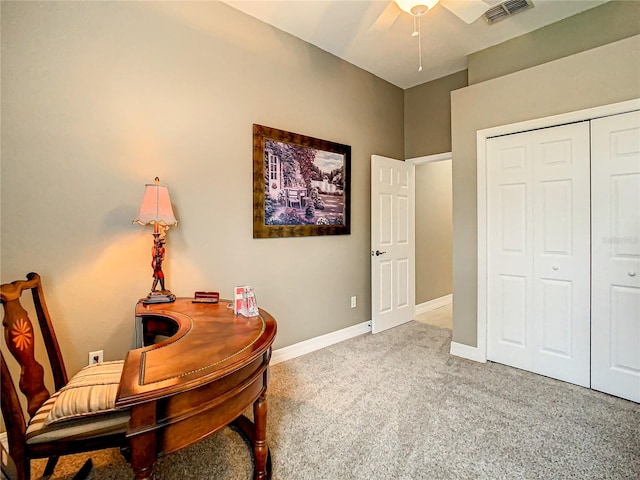 office space featuring ceiling fan and carpet flooring