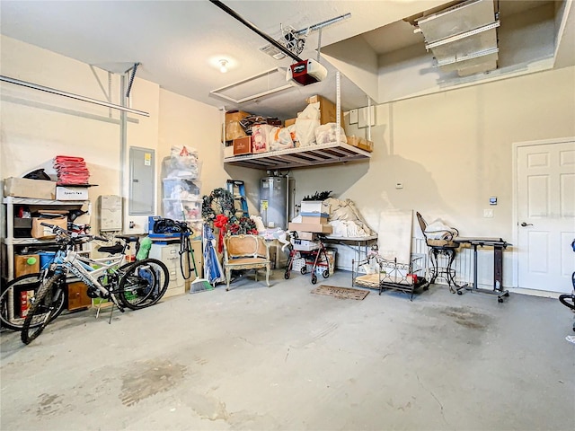 garage featuring electric panel, gas water heater, and a garage door opener