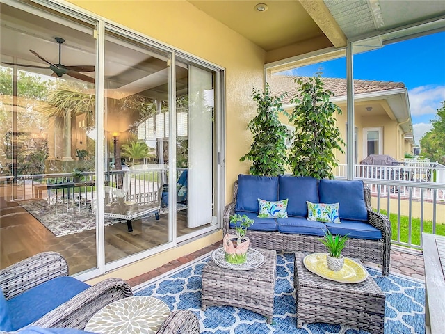 view of patio / terrace featuring an outdoor living space and ceiling fan