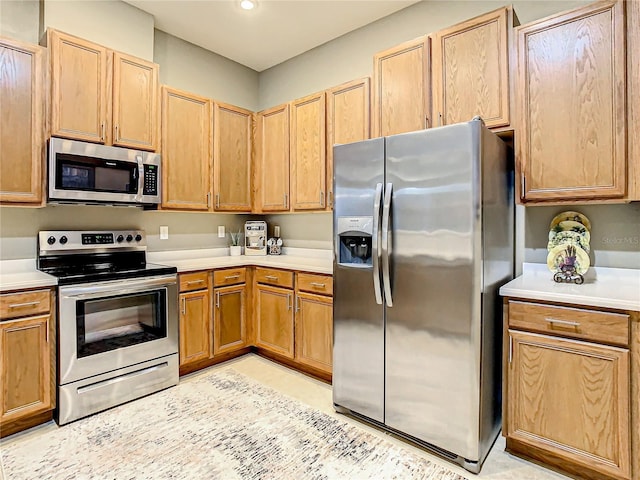 4737 Casswell Dr, New Port Richey, FL 34652 - kitchen with stainless steel appliances, light countertops, and recessed lighting