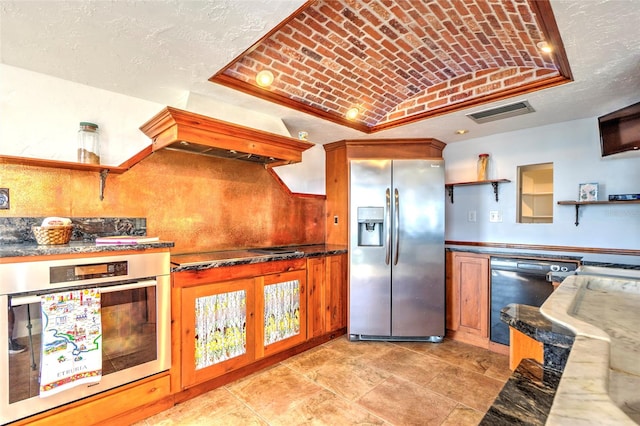 kitchen with open shelves, stainless steel appliances, visible vents, vaulted ceiling, and brick ceiling