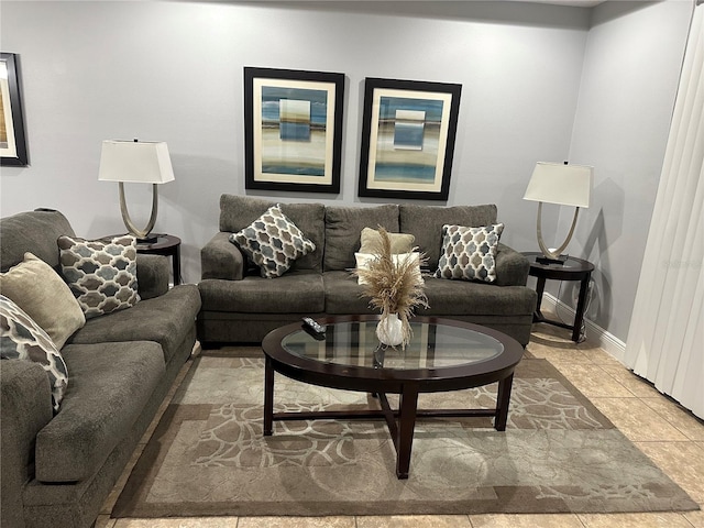 living room with light tile patterned flooring