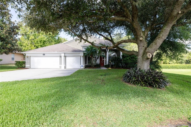 single story home with a front lawn and a garage