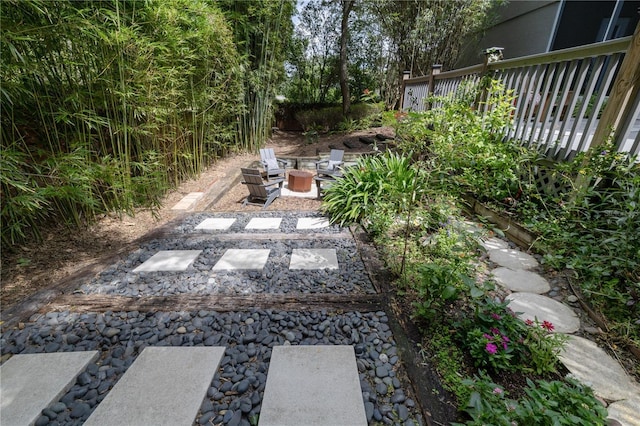 view of yard with a fire pit