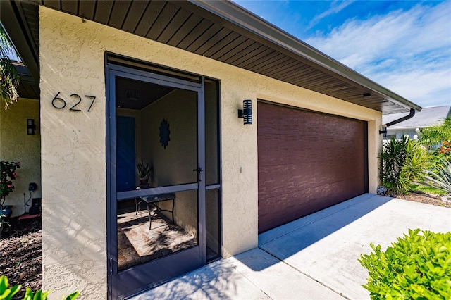 entrance to property with a garage