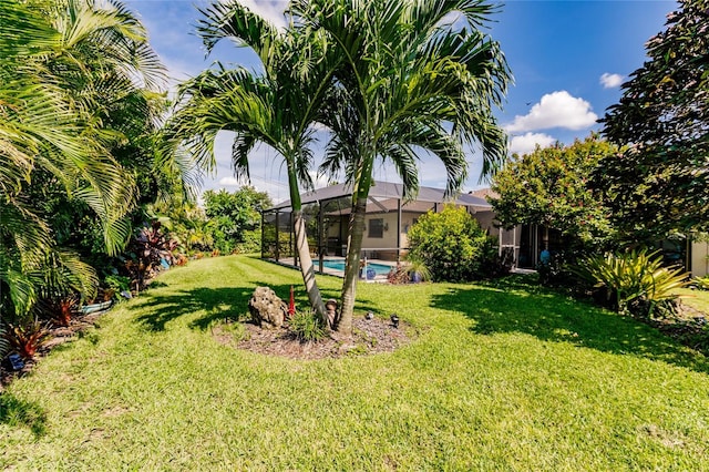 view of yard featuring a lanai