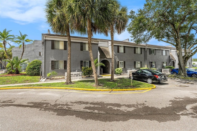 3822 Cortez Dr Unit D, Tampa, FL 33614 - view of building exterior featuring uncovered parking