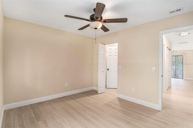 3822 Cortez Dr Unit D, Tampa, FL 33614 - unfurnished room featuring light wood-type flooring, a ceiling fan, and baseboards
