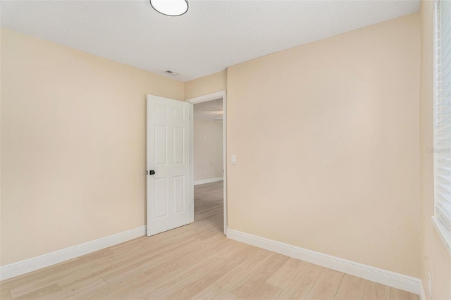 3822 Cortez Dr Unit D, Tampa, FL 33614 - empty room with light wood-style floors and baseboards