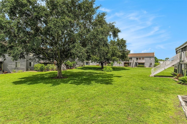 3822 Cortez Dr Unit D, Tampa, FL 33614 - view of grassy yard with stairway