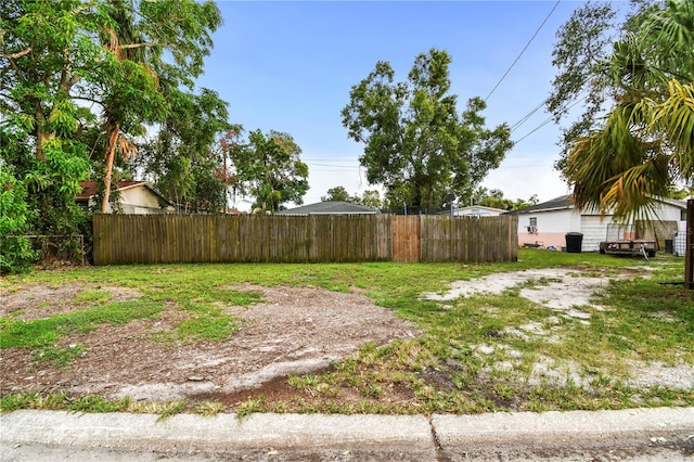 view of yard featuring fence